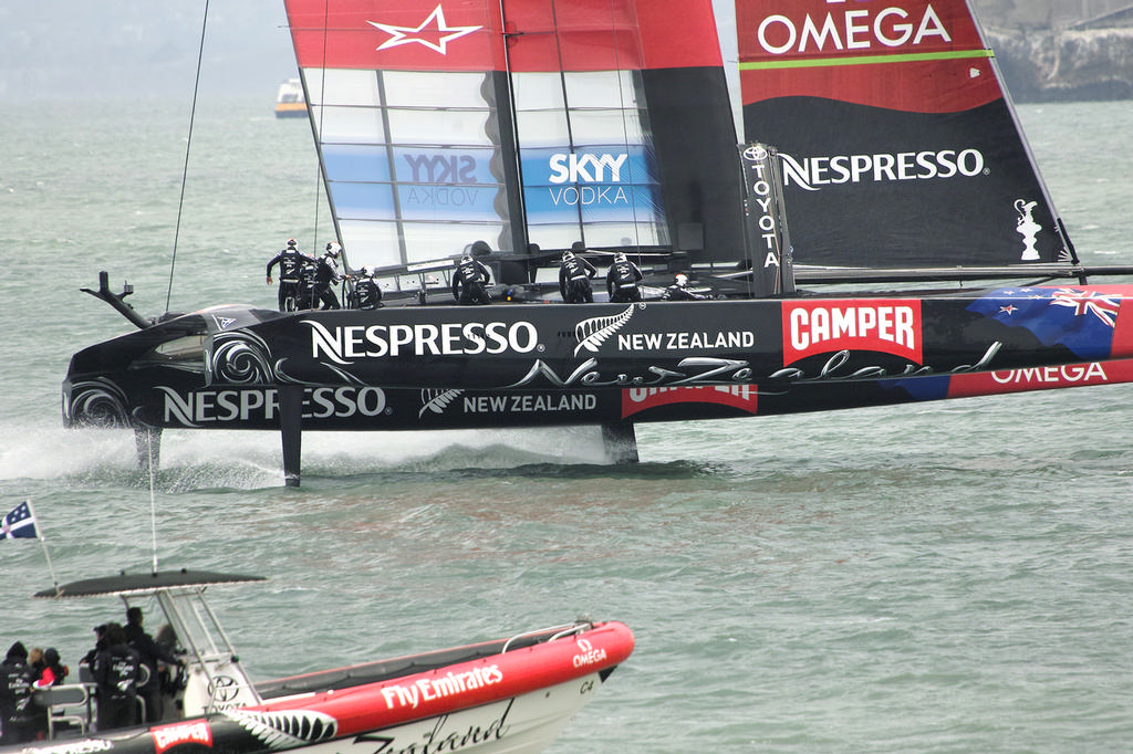 ETNZ gybing under the watchful eyes of one of their chase boats.  - America's Cup © Chuck Lantz http://www.ChuckLantz.com